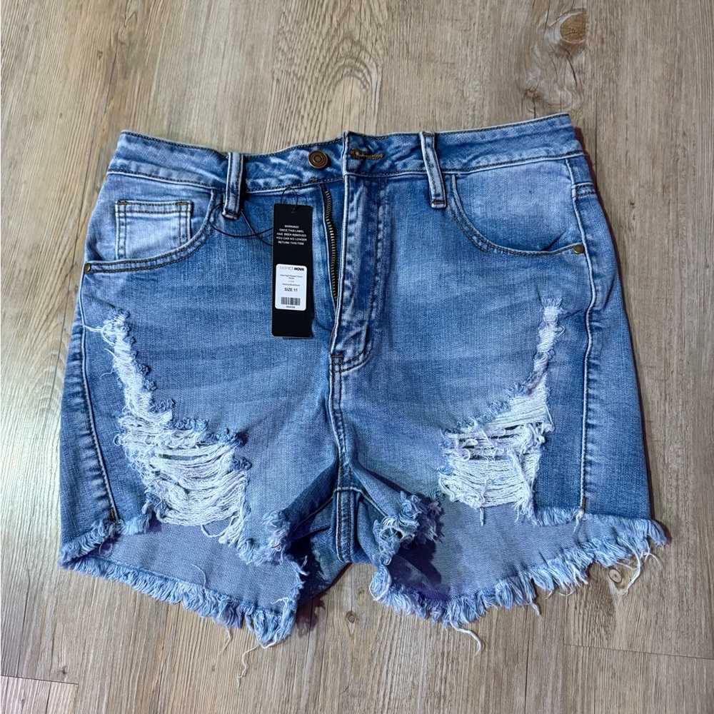 Fashion Nova Date Night Ripped Denim Shorts